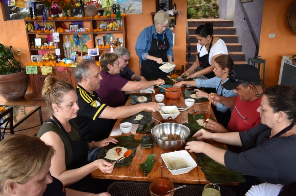 Luxury learning vacation - guests making tamales